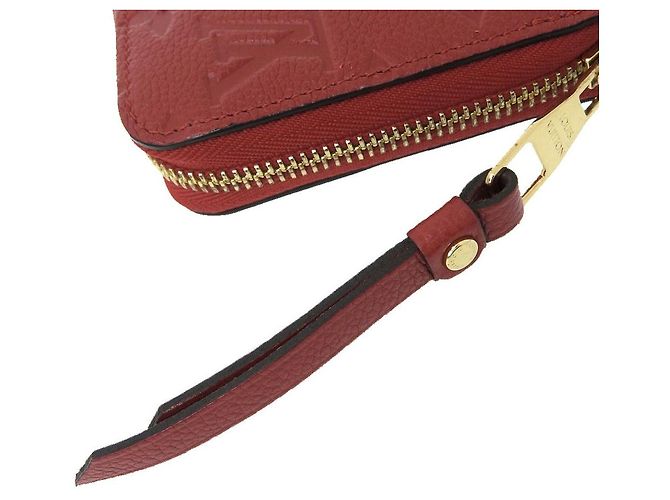 Cartera Zippy Monogram Empreinte Louis Vuitton Roja - vista 5