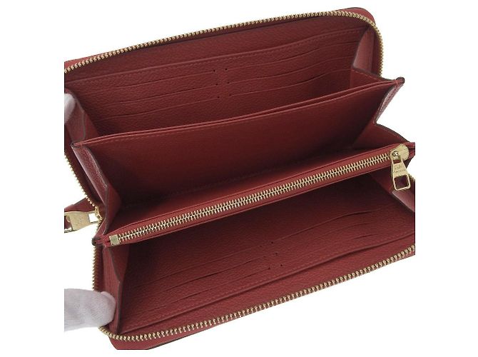 Cartera Zippy Monogram Empreinte Louis Vuitton Roja - vista 6