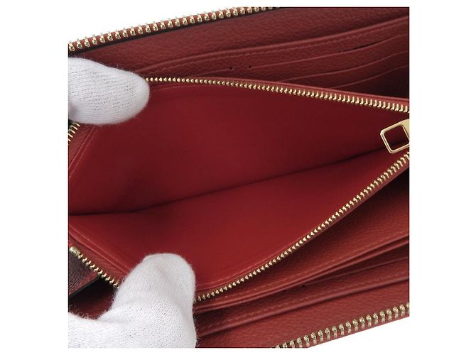 Cartera Zippy Monogram Empreinte Louis Vuitton Roja - vista 7