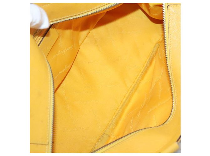 Bolso de mano Gancini de lona amarilla y plata de Salvatore Ferragamo Auth 128676 Amarillo - vista 16