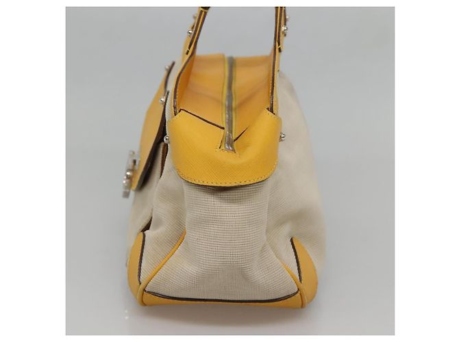 Bolso de mano Gancini de lona amarilla y plata de Salvatore Ferragamo Auth 128676 Amarillo - vista 5