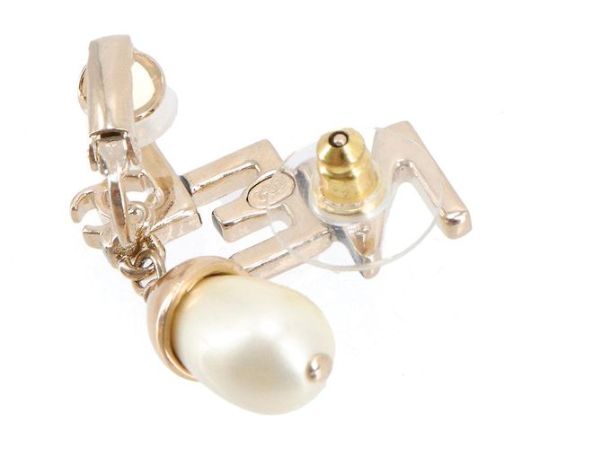 CHANEL - Boucles d'oreilles Chanel en métal doré champagne - vue 4