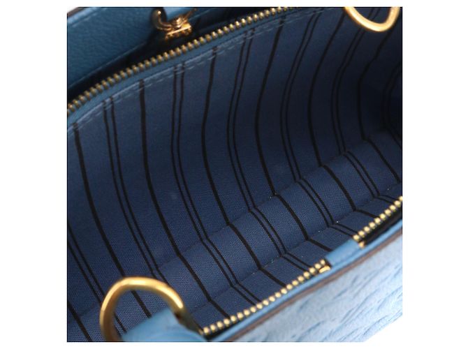 LOUIS VUITTON - Borsa Louis Vuitton Montaigne PM in pelle empreinte blu - vista 9