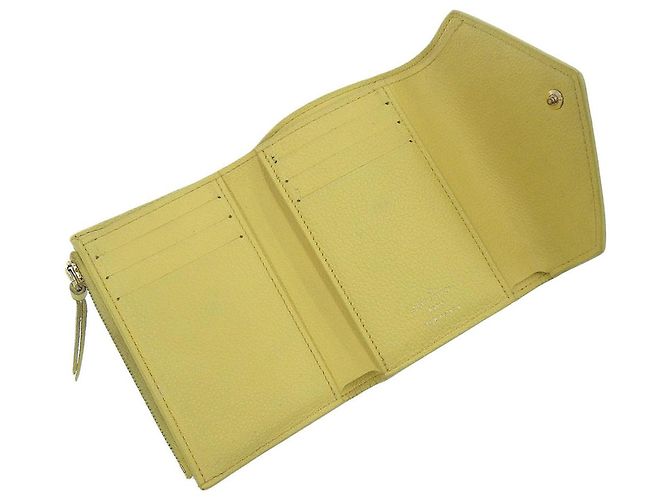Cartera Louis Vuitton Monogram Empreinte M81428 Amarillo - vista 8