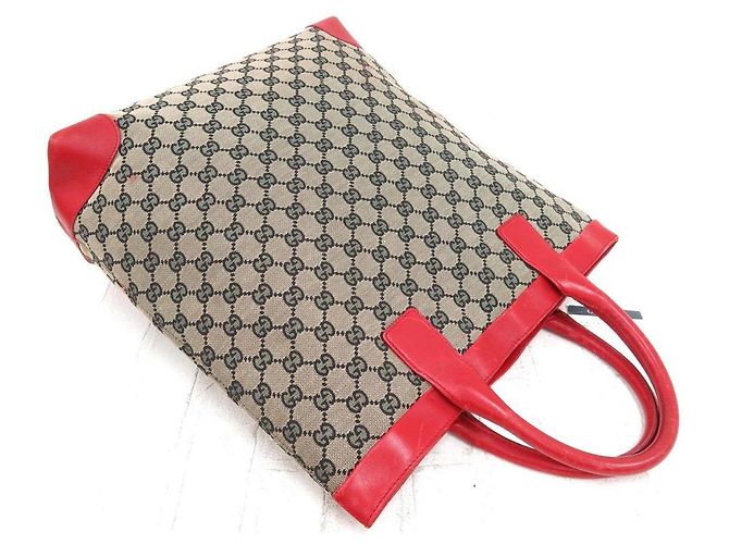 Marmont Gucci GG Leder- und Canvas-Shopper
Modellnummer: 0021121 - Rot Beige - Ansicht 2
