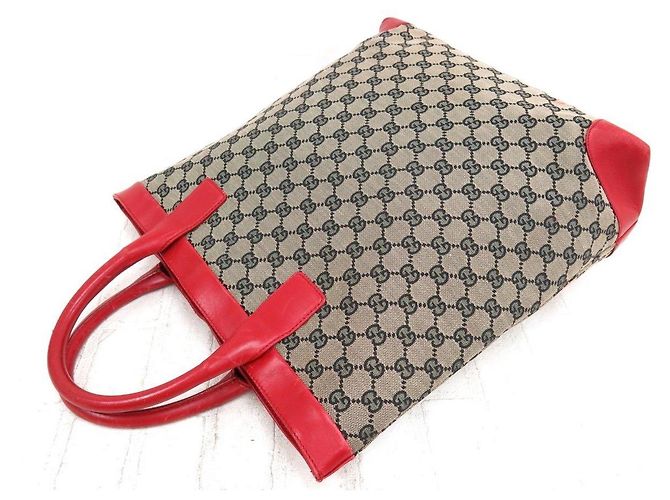 Marmont Gucci GG Leder- und Canvas-Shopper
Modellnummer: 0021121 - Rot Beige - Ansicht 3