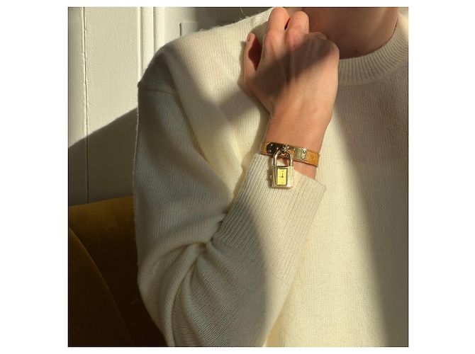 Montre Hermès Kelly dorée en cuir d'autruche - vue 2