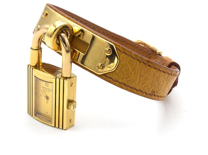 Montre Hermès Kelly dorée en cuir d'autruche - vue 3