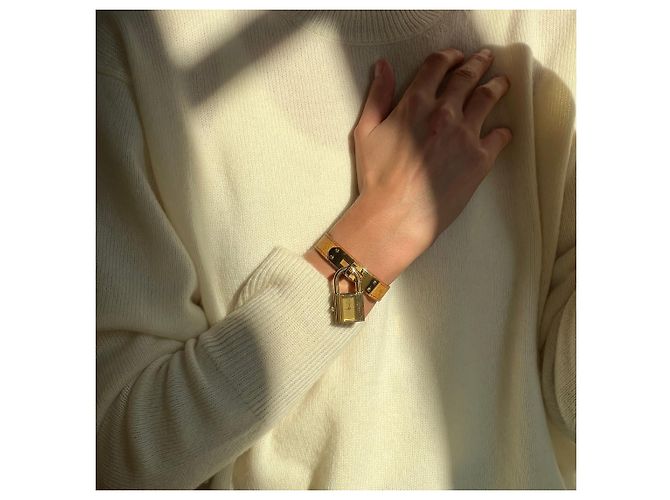 Montre Hermès Kelly dorée en cuir d'autruche - vue 5