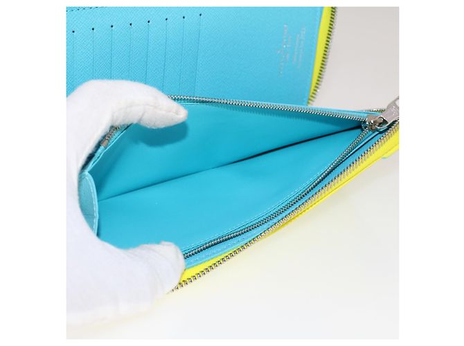 Carteira Vertical Zippy Playground LOUIS VUITTON Amarela M82005 Auth 48507SM Amarelo - vista 11