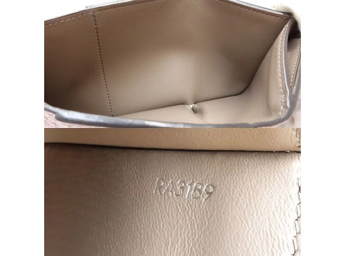 Billetera tri-fold Capucines XS Louis Vuitton - vista 9