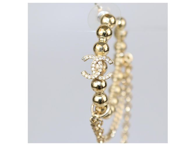 Orecchini a cerchio in metallo dorato con cristalli CC di Chanel D'oro - vista 4