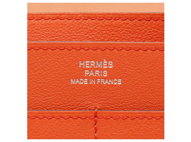 Portafoglio Hermès Dogon Duo GM in Veau Swift Arancione - vista 4
