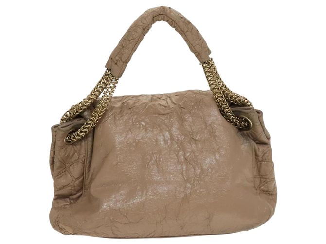 Bolsa de Ombro CHANEL em Couro Vinilado Bege Dourado CC Auth 133615 - vista 2
