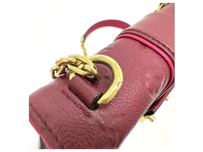 Bolso de cadena Saint-Sulpice PM en Monogram Empreinte Louis Vuitton Roja - vista 16