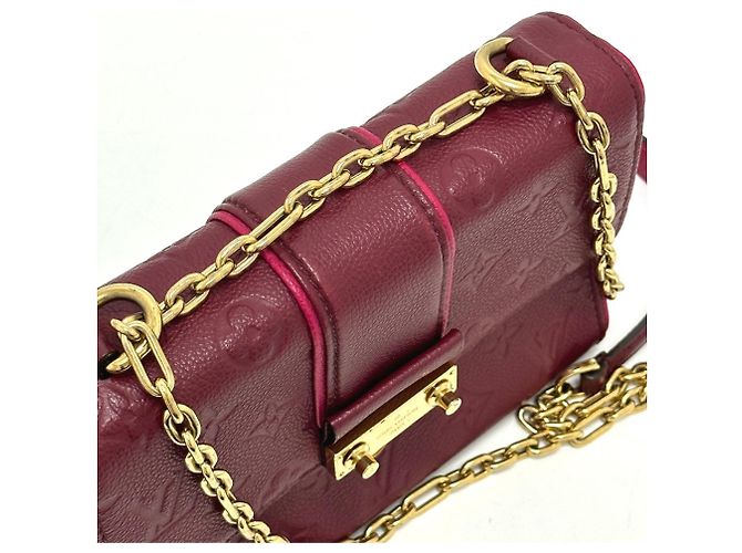 Bolso de cadena Saint-Sulpice PM en Monogram Empreinte Louis Vuitton Roja - vista 5