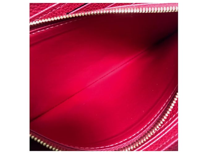 Cartera Zippy Monogram Empreinte Louis Vuitton Roja - vista 10