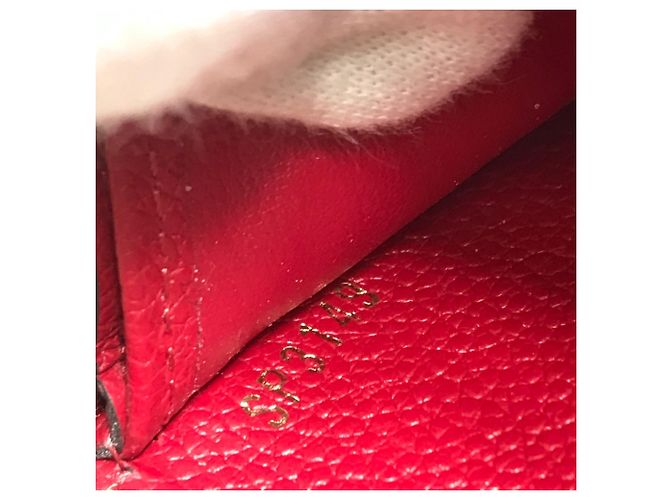 Cartera Zippy Monogram Empreinte Louis Vuitton Roja - vista 13