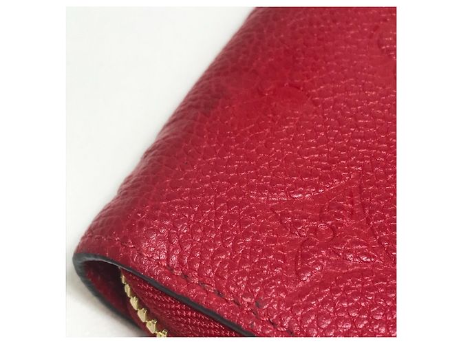 Cartera Zippy Monogram Empreinte Louis Vuitton Roja - vista 6