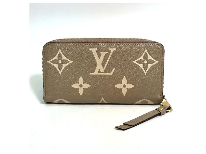 Cartera Larga Monogram Empreinte Louis Vuitton Beige Gris - vista 2