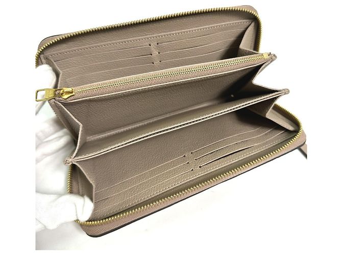 Cartera Larga Monogram Empreinte Louis Vuitton Beige Gris - vista 8