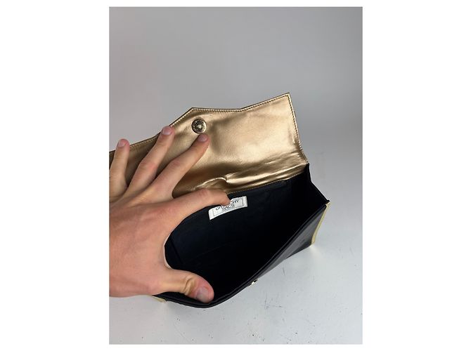 Clutch in pelle e tela vintage Givenchy nero e oro - vista 3
