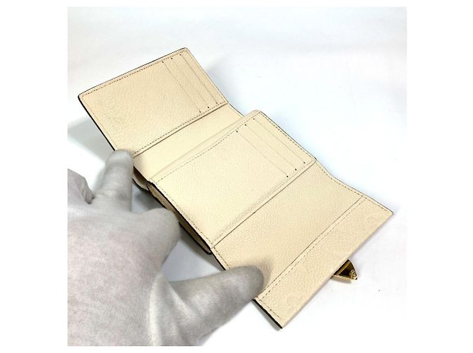 Billetera Tri-Fold Monogram Empreinte Louis Vuitton - vista 10
