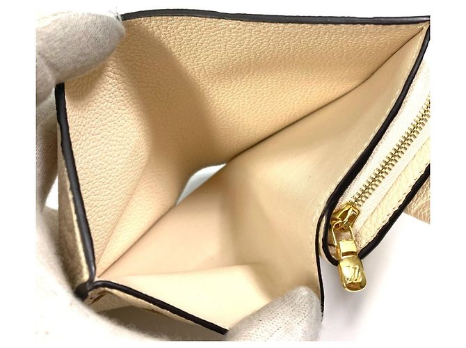 Billetera Tri-Fold Monogram Empreinte Louis Vuitton - vista 11
