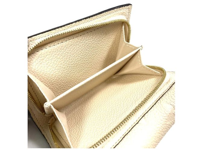 Billetera Tri-Fold Monogram Empreinte Louis Vuitton - vista 12
