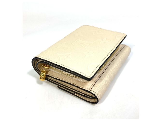 Billetera Tri-Fold Monogram Empreinte Louis Vuitton - vista 5
