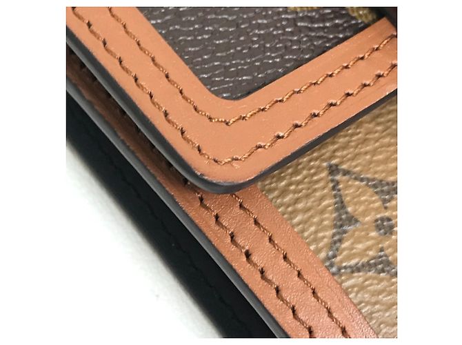 Portafoglio Compact Trifold Dauphine Monogramma Inverso Louis Vuitton Marrone - vista 5