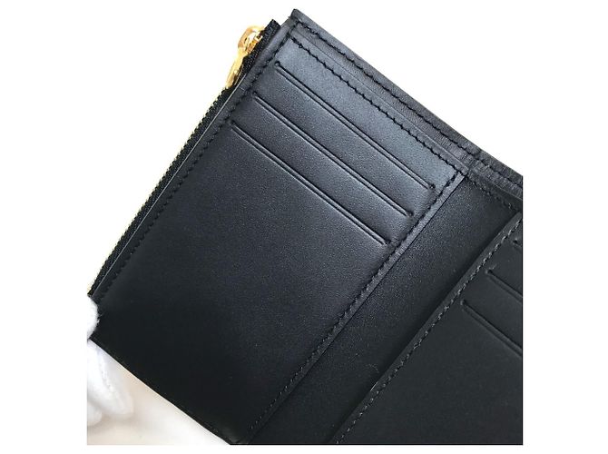 Portafoglio Compact Trifold Dauphine Monogramma Inverso Louis Vuitton Marrone - vista 9