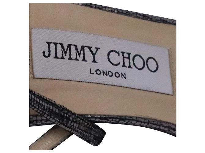 Sandali con tacco Tizzy 100 Pixelated in pelle argentata di Jimmy Choo - vista 9
