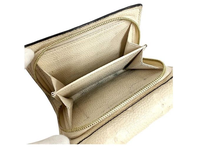 Metis Cartera plegable Monogram Empreinte Louis Vuitton Crudo - vista 6