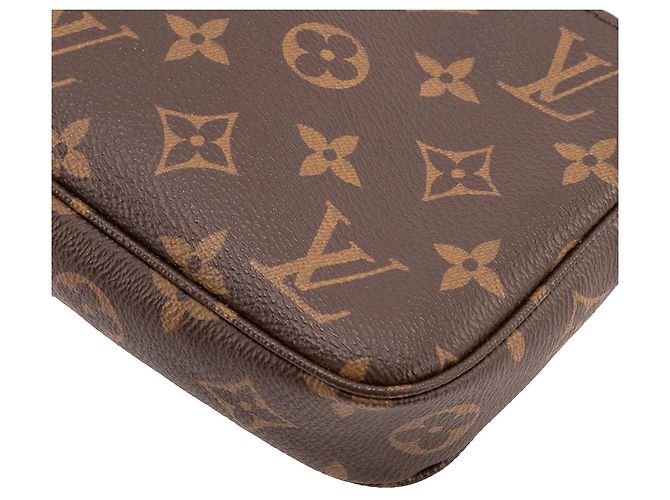 LOUIS VUITTON - Pochette Accessoires Louis Vuitton aus beschichtetem Monogramm-Canvas - Ansicht 7