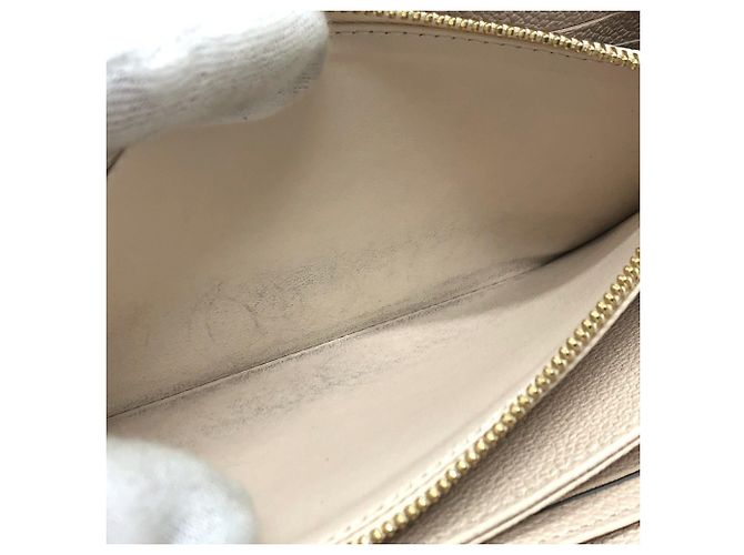 Cartera Zippy Monogram Empreinte Louis Vuitton Beige - vista 11