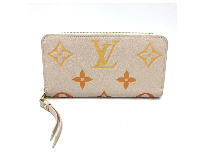 Cartera Zippy Monogram Empreinte Louis Vuitton Beige - vista 2