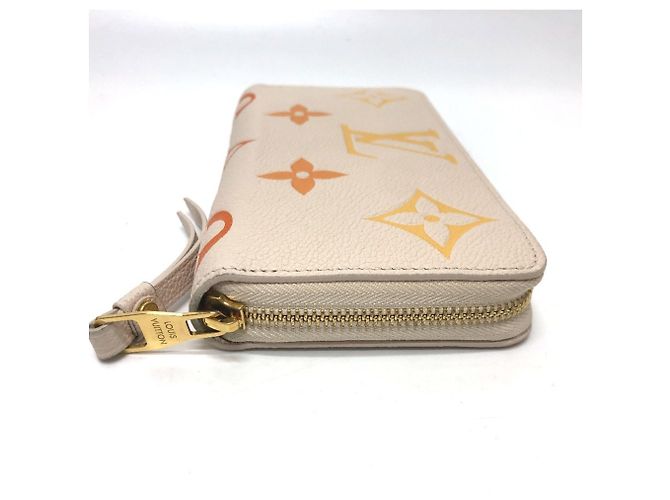 Cartera Zippy Monogram Empreinte Louis Vuitton Beige - vista 3