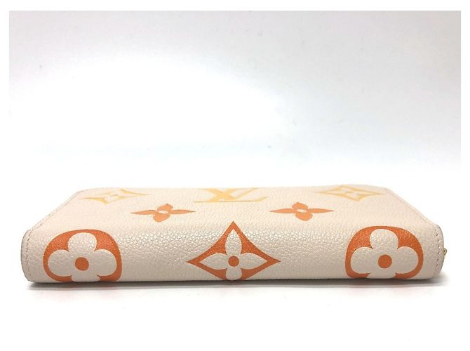 Cartera Zippy Monogram Empreinte Louis Vuitton Beige - vista 4