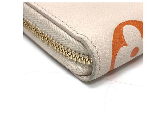 Cartera Zippy Monogram Empreinte Louis Vuitton Beige - vista 5