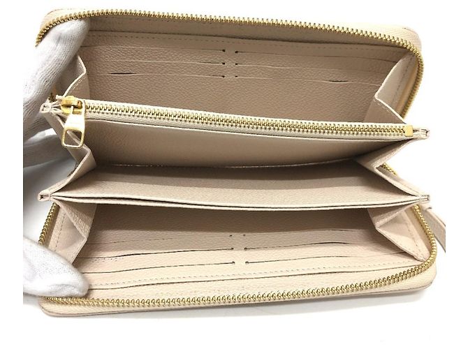 Cartera Zippy Monogram Empreinte Louis Vuitton Beige - vista 9