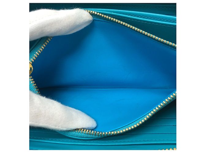 Cartera Zippy Monogramada Louis Vuitton Azul Dorado - vista 10