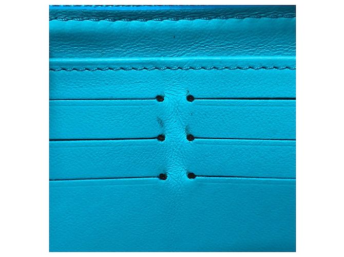 Cartera Zippy Monogramada Louis Vuitton Azul Dorado - vista 11