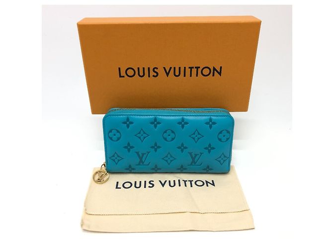 Cartera Zippy Monogramada Louis Vuitton Azul Dorado - vista 16