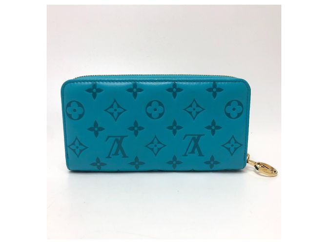 Cartera Zippy Monogramada Louis Vuitton Azul Dorado - vista 2