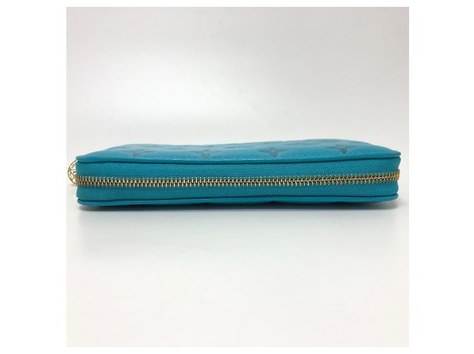 Cartera Zippy Monogramada Louis Vuitton Azul Dorado - vista 4