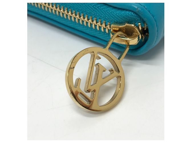 Cartera Zippy Monogramada Louis Vuitton Azul Dorado - vista 6