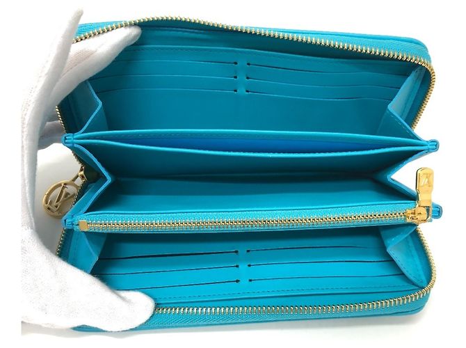 Cartera Zippy Monogramada Louis Vuitton Azul Dorado - vista 9