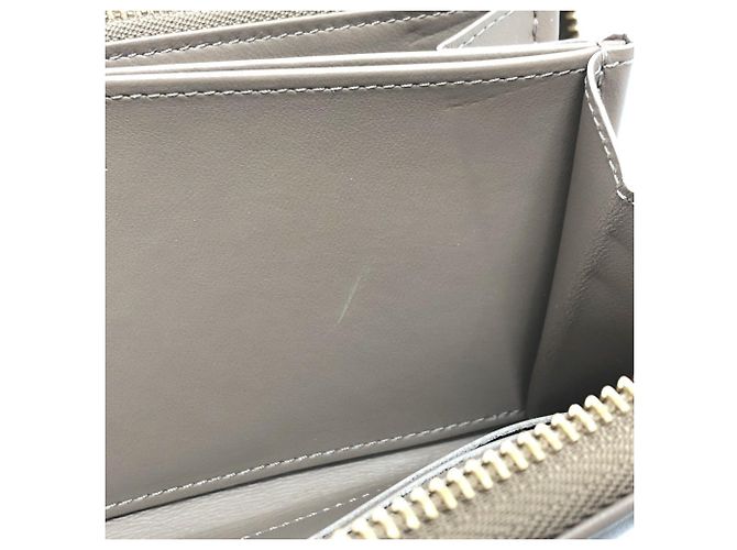 Carteira Zippy Monogram Embossada Louis Vuitton Bege - vista 11