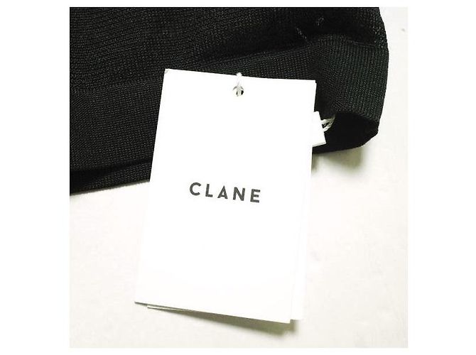 Autre Marque CLANE TRANSPARENTER V-AUSSCHNITT STRICKTOP
Stricktop Schwarz - Ansicht 4